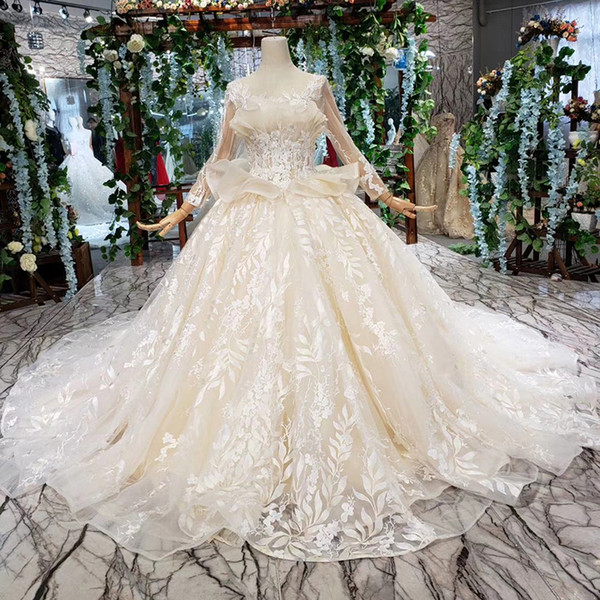 2022Latest Lebanon Wedding Dresses Shell Chest Illusion O Neck Long Tulle Sleeve Ruffle Lace Up Back Sequins Applique Pattern Bridal Gowns