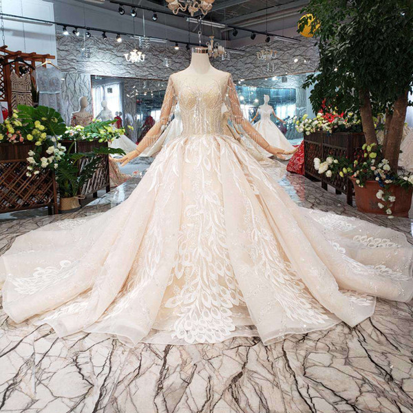 2022Newest Style Luxury Wedding Dress Detail Applique Long Train Illusion Long Sleeve Wedding Gown Shining Beaded Tassel Bridal Gown Dubai