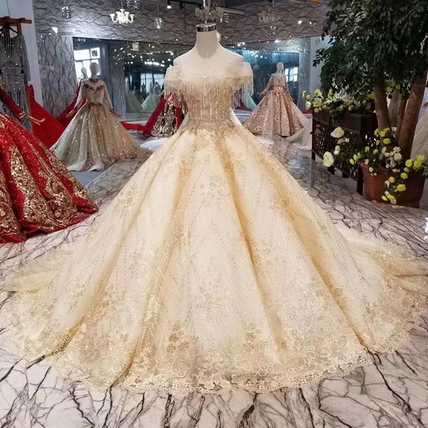 Luxury Dubai Wedding Dress With Long Beaded Train Off Shoulder Tassel Applique Shiny Bridal Gown Ball Gown Sweetheart Dress 2022New Style