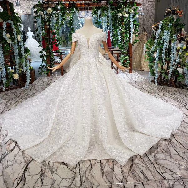 2022Latest Bohemian Wedding Dresses Illusion Sweetheart Neck Short Sleeve Backless Lace Up Back Sequin Applique Pattern Bridal Gowns Beach