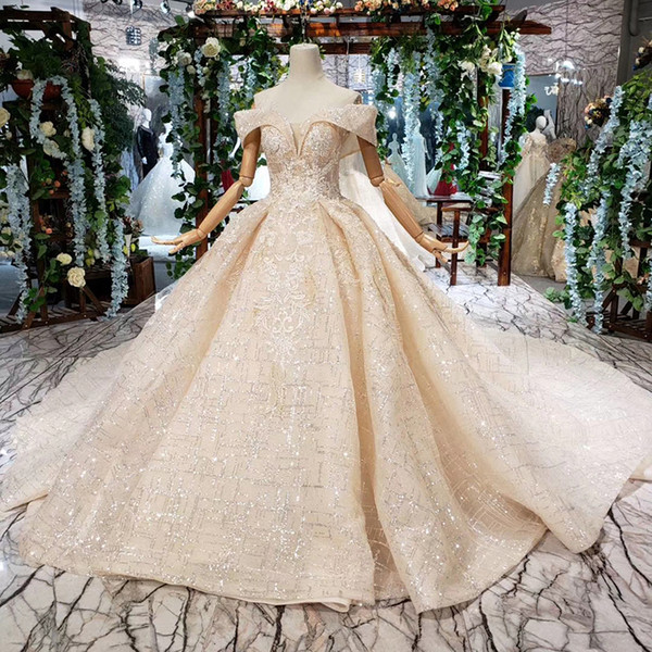 2022Latest Lebanon Wedding Dresses Illusion Sexy Sweetheart Neck Short Sleeve Backless Lace Up Back Sequins Appliques Pattern Bridal Gowns