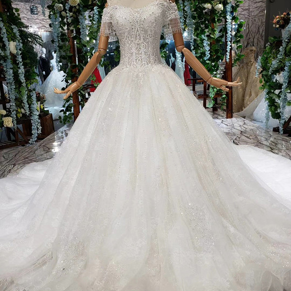 2022Latest Bohemian Wedding Dresses Beaded Short Sleeve Backless Lace Up Back Sexy Sweetheart Neck Crystal Sequins Appliques Bridal Gowns