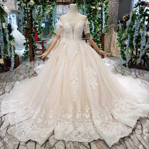 2022Latest Lebanon Wedding Dresses Short Sleeve Illusion O Neck Open Keyhole Lace Up Back Sequins Applique Pattern Crystal Bridal Gowns