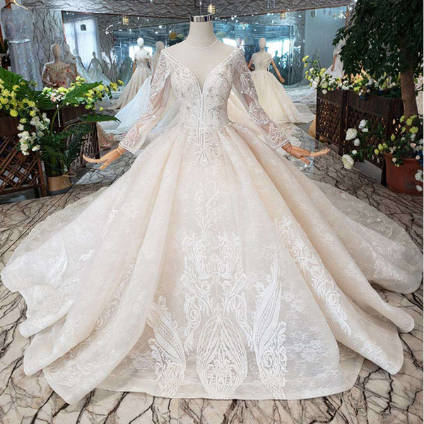 2022Newest Design Lebanon Wedding Dresses Long Tulle Sleeve Illusion Deep V Neck Wedding Gowns Open Keyhole Back Crystal Garden Bridal Gown