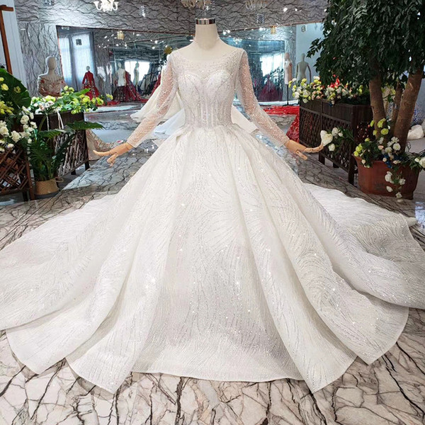 2022Newest Design Shining Wedding DressO-Neck Long Tulle Sleeve Lace Up Open Keyhole Back Luxury Beaded Long Train Wedding Gown Dubai