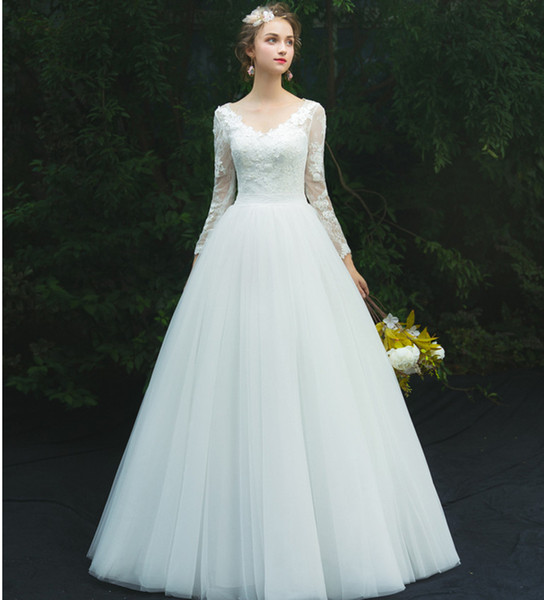 Long Sleeves Ball Gown Wedding Dress with Lace Appliques Button Covered Back Bridal Dresses White Ivory