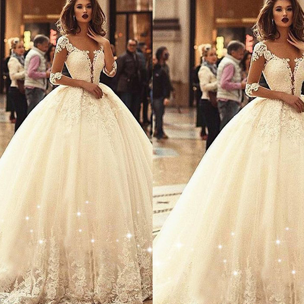 Ball Gown Wedding Dresses Sweetheart Neckline Lace Appliques Long Sleeve Crystal Tulle Floor Length Bridal Dresses Vestidos de Fiesta