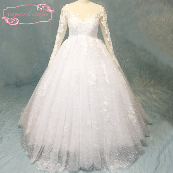 Ball Gown Wedding Dresses Crew Neckline Lace Appliques Beading Sequins Long Transparent Sleeve Puffy Bridal Dresses Gowns