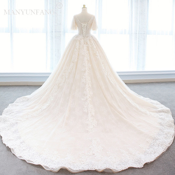 Charming Plus Size Arabic Nigerian Short Sleeves Wedding Dresses Beading Cap Sleeve Tulle Ruffles Wedding Dress Ball Bridal Gowns