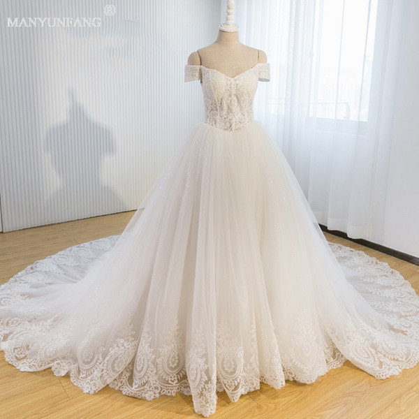 Castle Style Wedding Dresses Elegant White Lace Sweetheart Neck Capped Sleeves Tops Lace And Tulle Skirts Cathedral Train Bridal Gowns