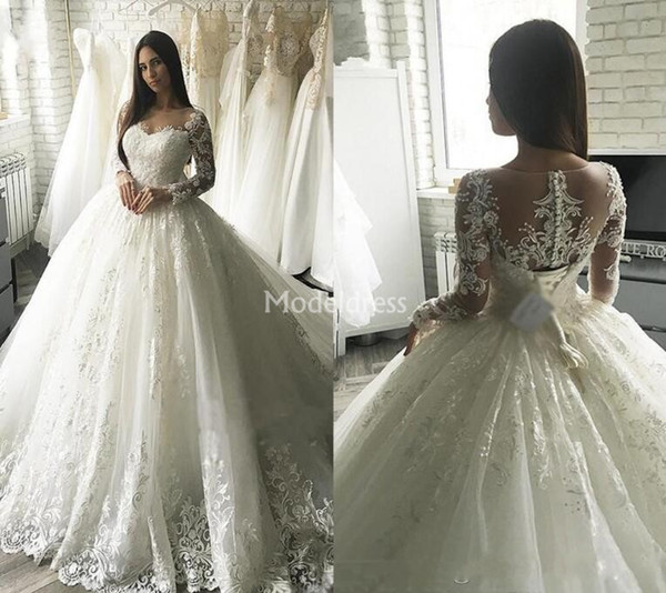 Dubai Modest Lace Wedding Dresses Sheer Neck Ball Gown Long Sleeves Sweep Train Illusion Bridal Gowns Button Appliques robe de mariée Custom