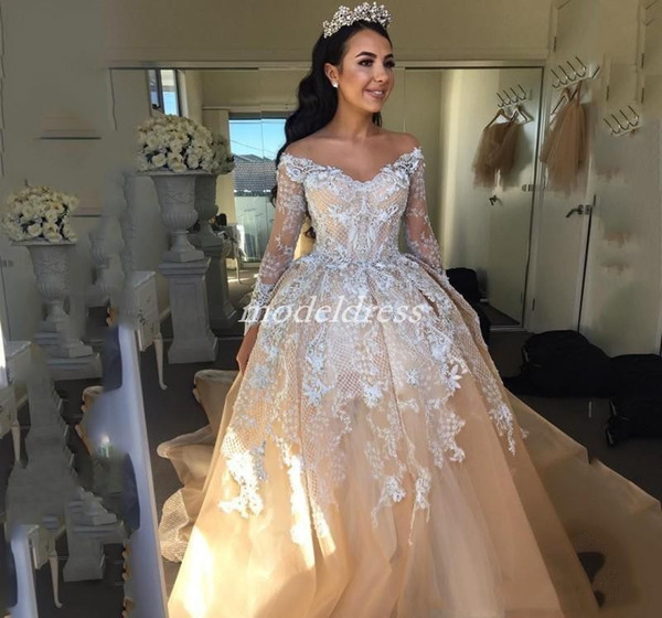 Princess Champagne Arabic Wedding Dresses Long Sleeve Sheer Jewel Neck Appliques Beads Sweep Train Chapel Garden Country Bridal Gowns 