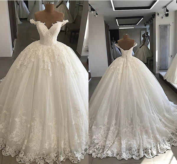 Ball Gown Wedding Dresses Off the Shoulder Tops Lace up Back Lace Appliques Sequins Sparkly Luxury Romantic Ivory Wedding Gowns Handmade