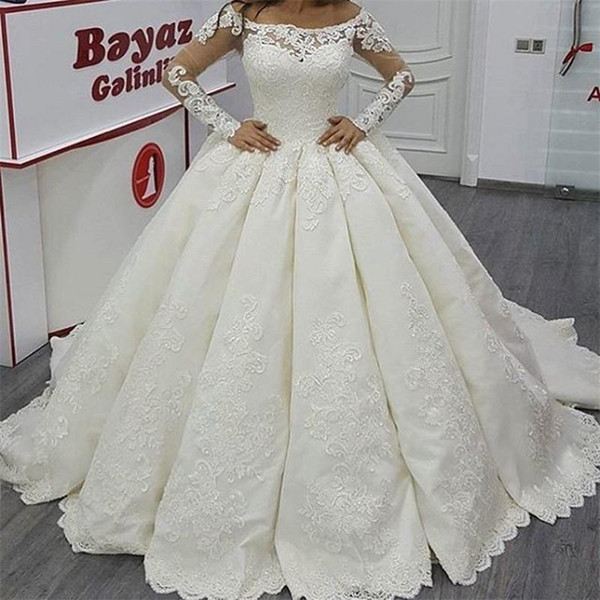 2017 Bateau Ball Gown Wedding Dresses Sexy Illusion Long Sleeves Lace Appliqued Floor Length Court Train Bridal Gowns