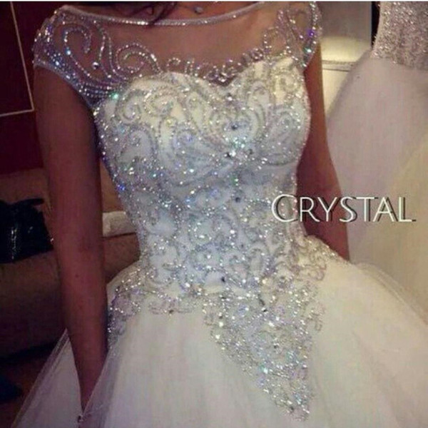 Luxurious Rhinestones Crystals Princess Wedding Dresses Hot Selling New Real Image Cap Sleeve Ball Gown Tulle Sheer Bridal Gowns W210