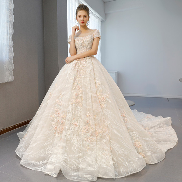 Luxury Modest Original OUYAFENGQING Wedding Dresses Boat Neck Appliques And Crystal Embellishment Beads With Long Train Ball Gowns