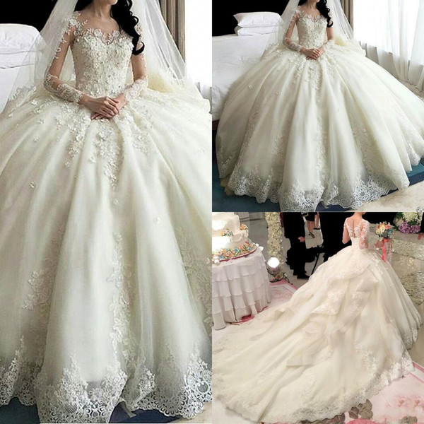 2017 Luxury Arabic Ball Gown Wedding Dresses Jewel Neck Long Sleeves Lace Appliques Flowers Cathedral Train Ruffles Plus Size Bridal Gowns