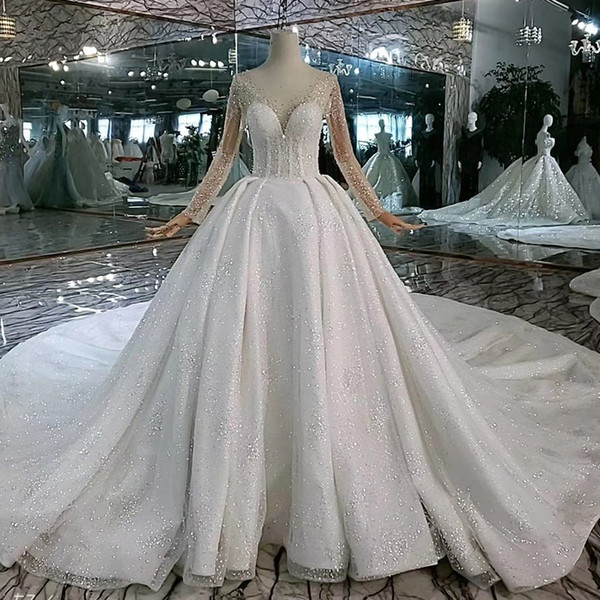 2022Latest Bohemian Wedding Dresses Long Tulle Sleeve Covered Button Illusion Sweetheart Neck Shining Crystal Beaded Bridal Gowns Beach