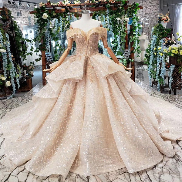 2022Latest Saudi Arabia Wedding Dress Tassel Short Sleeve Backless Lace Up Back Ruffle Sweetheart Neck Applique Sequins Bridal Gowns Garden