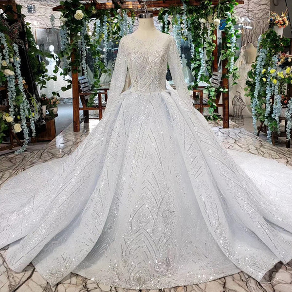 2022Latest Bohemian Wedding Dresses Long Tulle Sleeve Open Keyhole Back Illusion Neckline Sequins Pattern Applique Bridal Gowns Garden