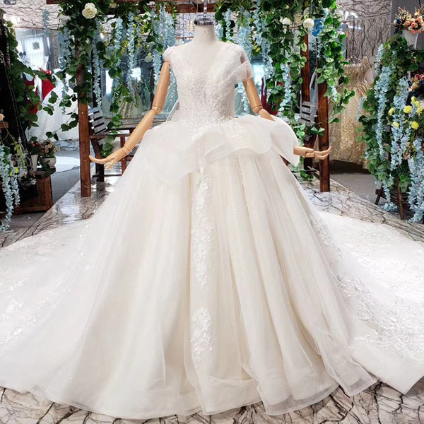 2022Latest Bohemian Wedding Dresses Shell Chest Sleeveless Illusion Deep V Neck Open Keyhole Lace Up Back Sequins Ruffle Bridal Gowns Beach