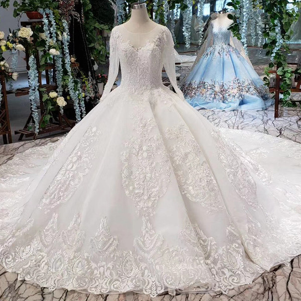 2022Latest Bohemian Wedding Dresses Long Tulle Sleeve Open Keyhole Lace Up Back Illusion Neckline O Neck Sequins Applique Bridal Gown Beach