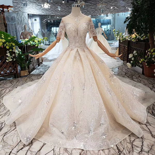 2022Newest Luxury Collar Wedding Dresses Illusion Deep Neckline Tulle Short Sleeve Shining Crystal Sequin Covered Button Garden Bridal Gown