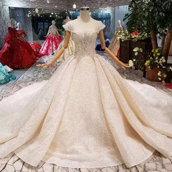 Luxury New Wedding Dresses O-Neck Crystal Cap Sleeves Ball Gown Hand Working Wedding Gowns With Long Train High Quality Saudi Arabia