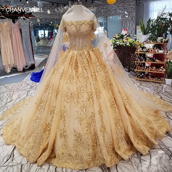 2022Saudi Arabia Luxury Wedding Dresses Long Lace Veil Shining Gold Hand Made Pattern Applique Bateau Short Sleeve Backless Wedding Gowns