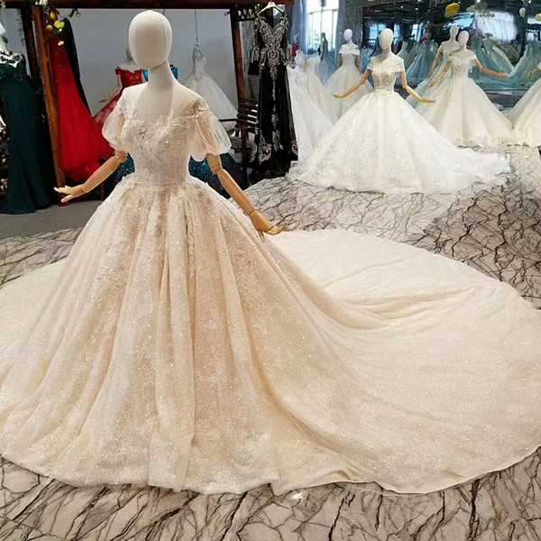 Luxury Princess Wedding Dress Puffy Short Sleeves O-Neck See-Through Back Wedding Gown With Long Train Shiny Wedding Party Dress