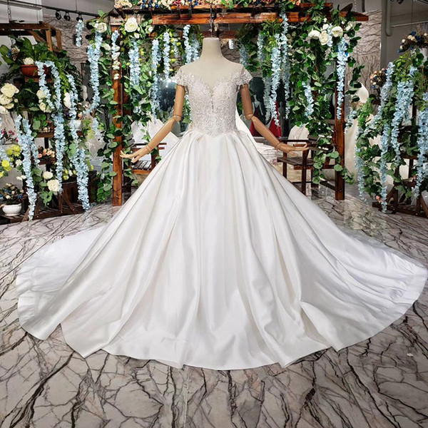 2022Latest Design Wedding Dresses Cap Sleeve Illusion V Neck Open Keyhole Lace Up Back Sequins Pattern Appliques Long Train Bridal Gowns