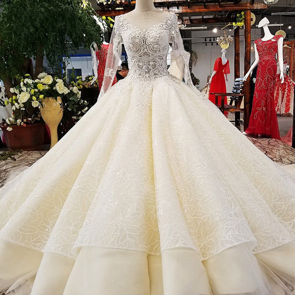 2022Lebanon Luxury Wedding Dresses Open Keyhole Back Long Tulle Sleeve Illusion Neckline Overskirts Hand Made Pattern Bridal Gowns