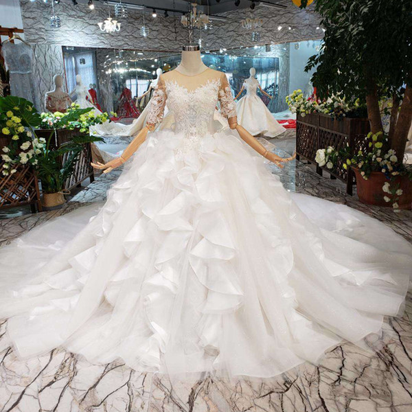 2022Newest Design Bow Wedding Dresses Cascading Ruffles Sexy Illusion Back Wedding Gown Detail Applique Long Train Bridal Gown Croatia