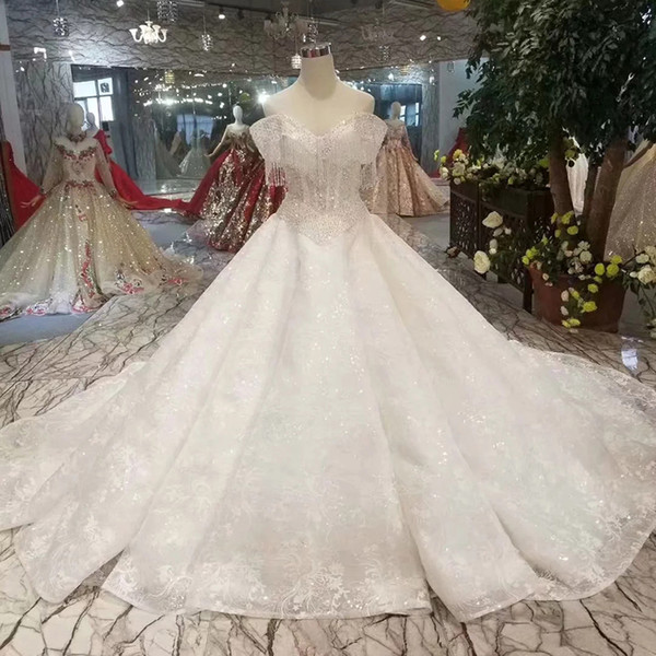 2022New Arrival Crystal Wedding Dress Off The Shoulder Sweetheart Luxury Ball Gown Wedding Gown With Long Train Tassel Sleeve Croatia