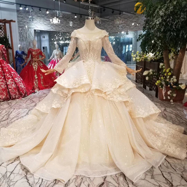 International New Design Wedding Dresses With Peplum O-Neck Long Sleeves Ball Gown Hot Luxury Wedding Gown Multi-Layer Skirt Saudi Arabia