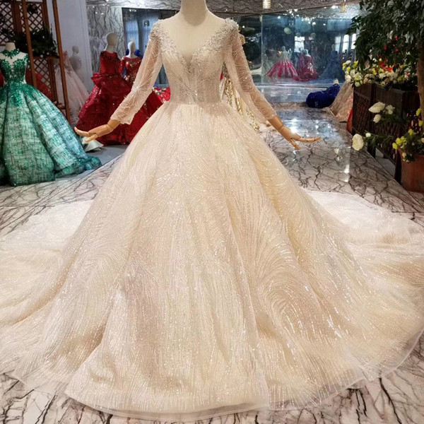 Luxury Shiny Wedding Dress Champagne O-Neck Long Sleeve Lace Crystal Beauty Bridal Gown Train Simple Wedding Party 2022New Design Dubai