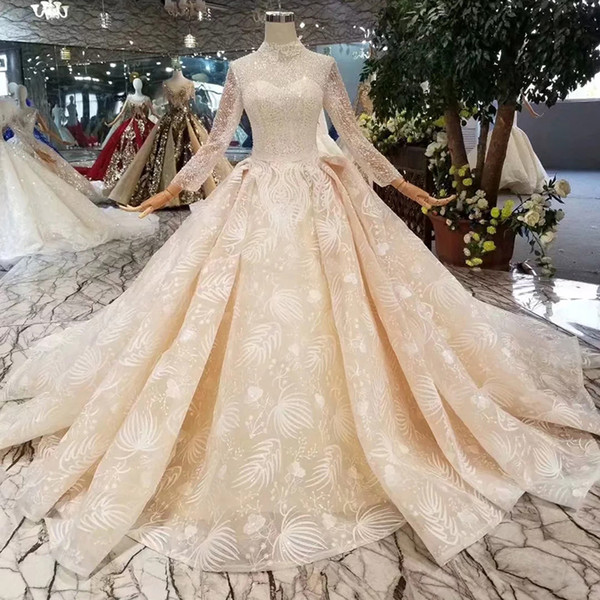 Lace Queens Wedding Dresses Champagne Elegant High Neck Crystal Beaded Illusion Long Sleeves Ball Gown Wedding Gowns With Long Train Muslim