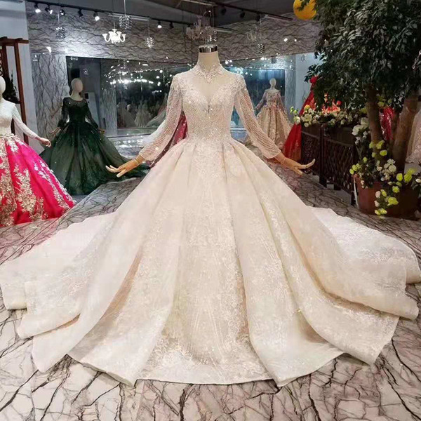 Elegant High Neck Wedding Dresses Champagne Crystal Illusion Long Sleeves Ball Gown Bridal Gowns With Long Train For Queens Castle