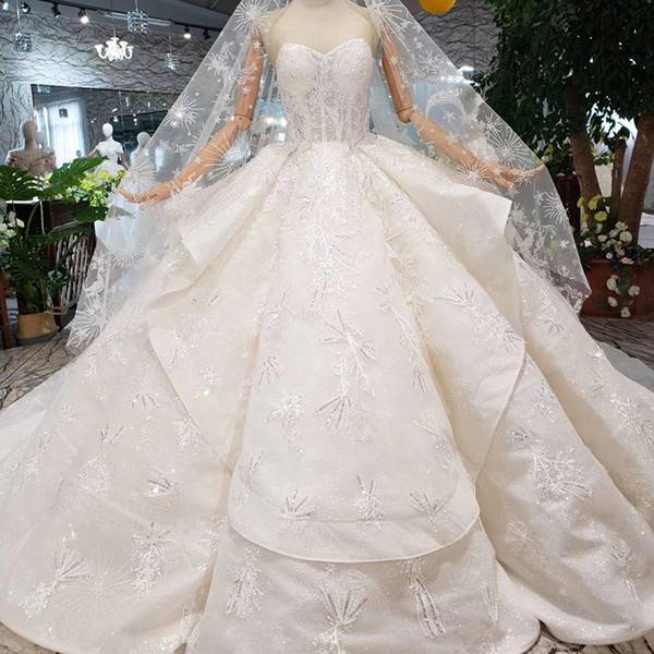 2022Bohemian Illusion Neckline Wedding Dresses Covered Button Tulle Back Sequins Applique Sleeveless Sweetheart Neck Beach Wedding Gowns