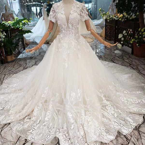 2022Newest Design Lebanon Wedding Dresses Sheer Deep V Neck Tulle Short Sleeve Wedding Gowns Illusion Lace Up Back Garden Bridal Gowns