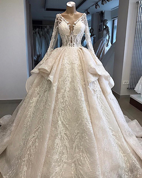 Gorgeous Ivory Lace Ball Gown Wedding Dresses Illusion Bodice Appliqued Sequined Luxury Bride Wedding Gowns Dubai Arabic With Peplum