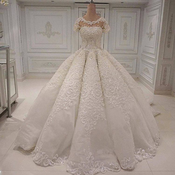 Fantastic White Ivory Ball Gowns Lace Wedding Dresses Cap Sleeves Jewel Neck Formal Bridal Gowns Appliques Sequins Arabic Robe de marrie