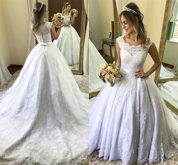 Elegant Ball Gown Cap Sleeve Wedding Dresses Dubai Arabic Style Appliques With Buttons Belt Summer Wedding Gowns