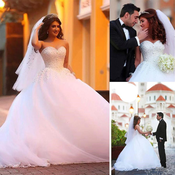 New Sweetheart Neckline Ball Gown Wedding Dresses with Beadings & Rhinestones full ball gown skirt flows Bridal Dresses