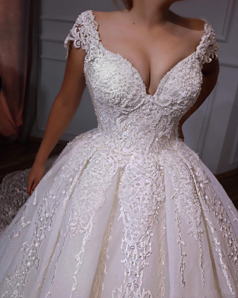 Luxurious Beaded Lace Wedding Dresses Cap Sleeves Appliques With Backless Ball Gown Bridal Dresses Vintage Sexy Wedding Gowns