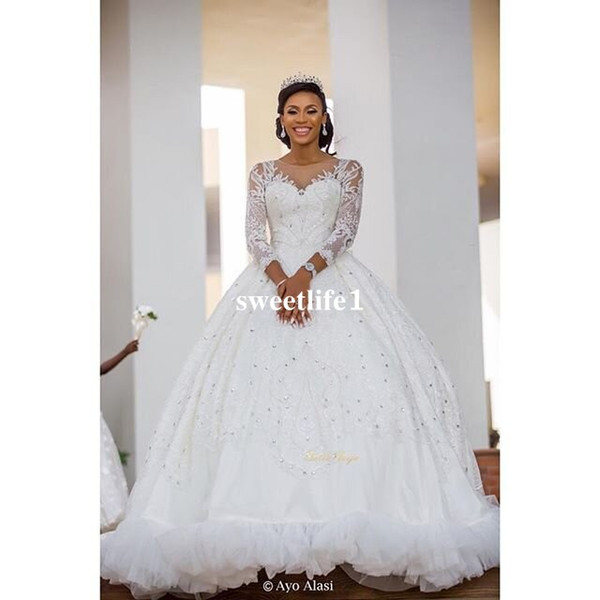 Gorgeous New Sheer Jewel Wedding Dresses Lace Appliques Beaded Long Sleeve Ball Gown Bridal Gown Custom Made Hot Sale For Church