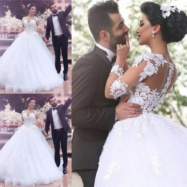 Saudi Arabic Middle East Ball Gown Wedding Dresses Sheer Jewel Long Sleeves Lace Appliques Button Back Long Vestidos Bridal Gowns