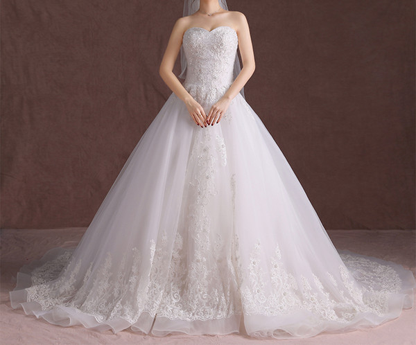 Stunning Wedding Dresses Ball Gown Court Train Wedding Dress Major Beading Sequins Lace-up Back Tulle with Lace Applique Bridal Gowns Ivory