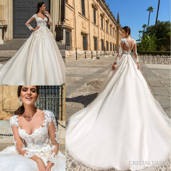 Designer Stunning Wedding Dresses with Sheer Long Sleeves Lace Appliqued Peals Chapel Train Bridal Gowns Vestidos De Noiva