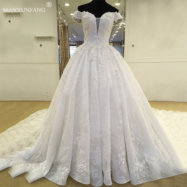 Capped Sleeves Lace Empire Castle Wedding Dresses 2018 Sexy Illusion Cathedral Train Sexy Formal Boho Real Photo Tiers Skirt Bridal Gown